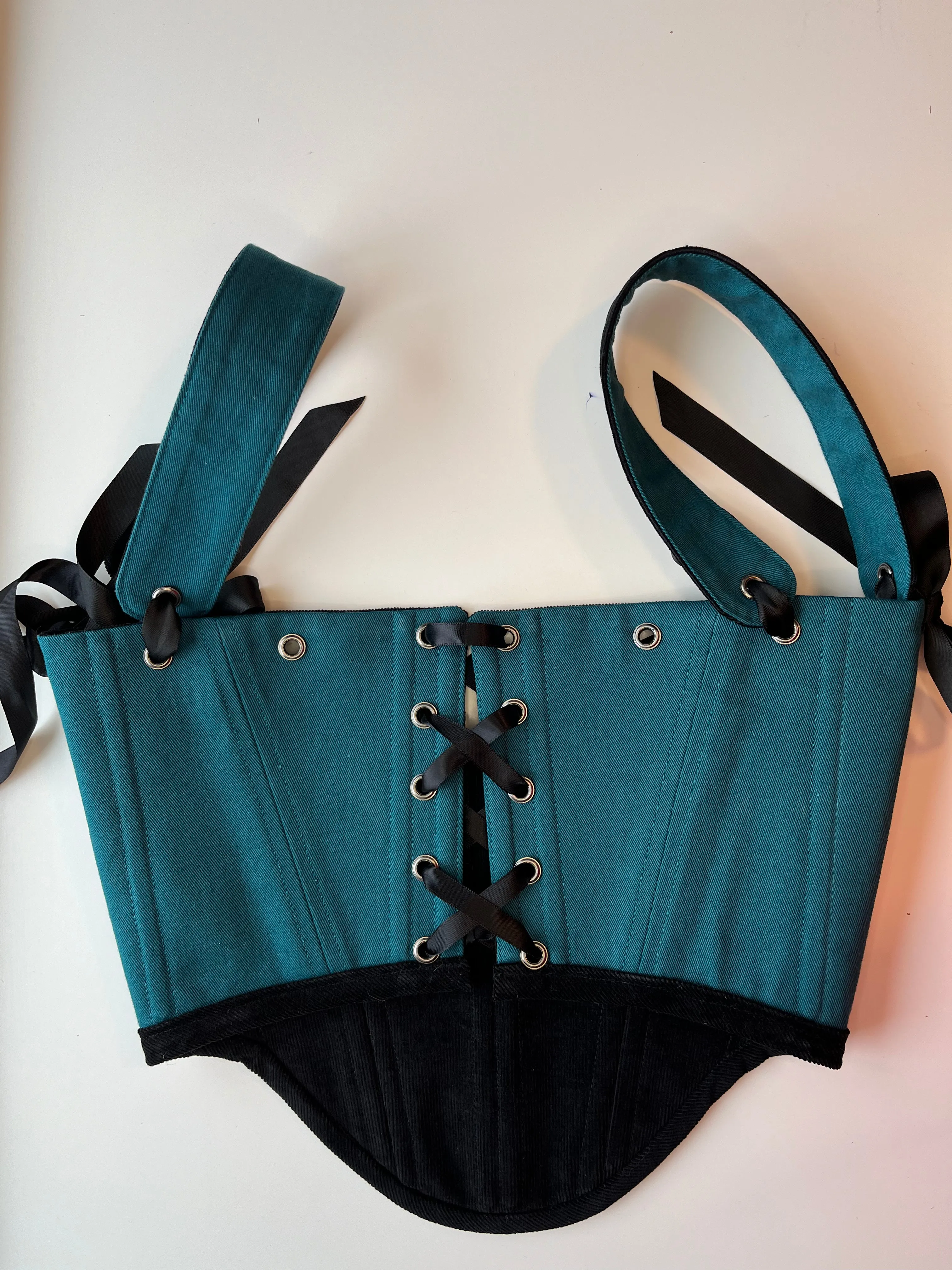 M-L reversible underbust corsage in black corduroy/teal denim with ribbon bows